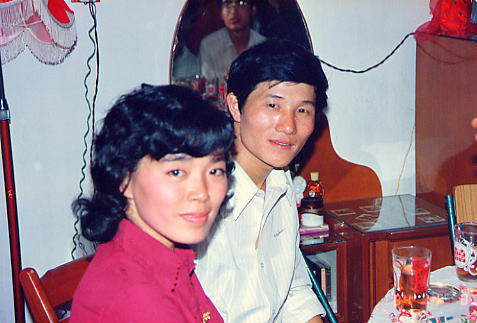 �V������̓�l